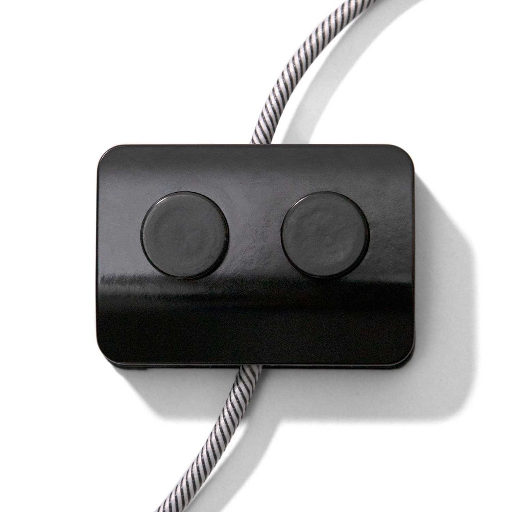 Interrupteur unipolaire noir à double commande au pied - Design by Achille Castiglioni